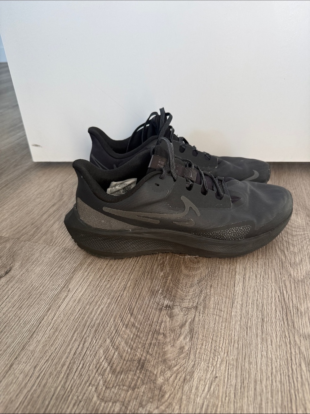 Nike waterproof Black Athletic Shoes with Subtle Gray Accents